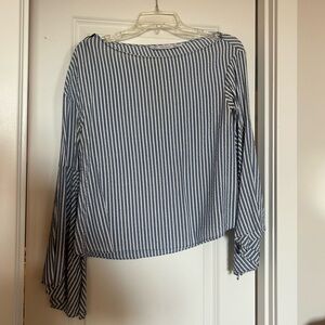 Zara blouse cute with white pants!